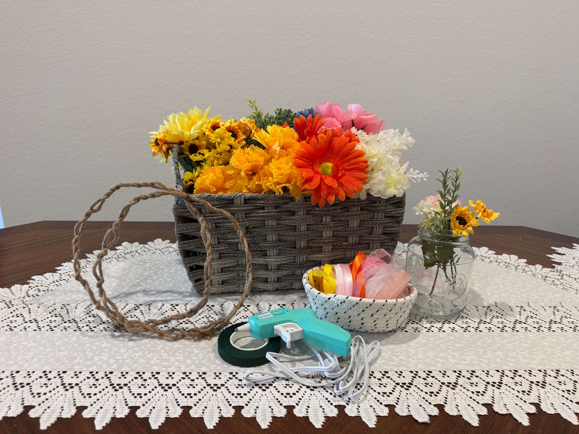 Basket of flowers and materials for crown making